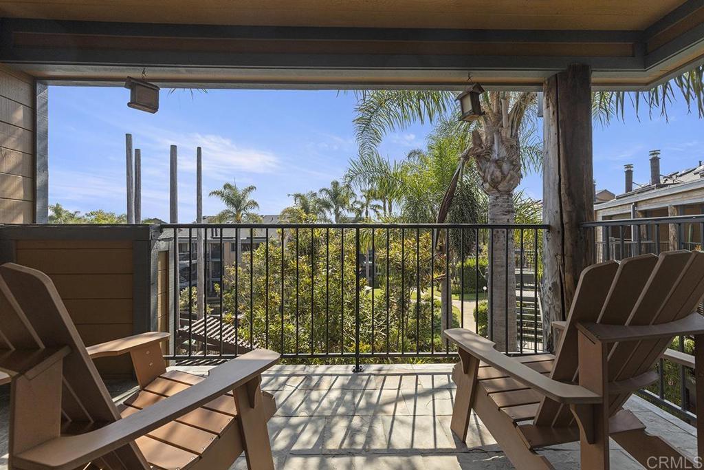 Welcome to your coastal escape in beautiful Windsong Cove Carlsbad, west of the 5! This stunning 2-bedroom, 2.5-bath condo offers the perfect blend of beachside living and modern comfort. Ideally located just a short stroll from Carlsbad Village and the iconic beaches, this home invites you to live the ultimate Southern California lifestyle. Step inside to discover a bright and airy layout featuring vaulted ceilings upstairs and dual master suites, each with its own en-suite bath. The updated kitchen boasts stylish finishes, modern appliances, and ample storage, while the remodeled bathrooms add a touch of luxury. Enjoy your morning coffee or evening wine from your private balcony with a serene view of the resort-style pool surrounded by lush tropical landscaping. There is even a spacious one car garage! The community offers a resort-like HOA experience with beautifully maintained grounds, sparkling pool and spa, and a tranquil, vacation-like atmosphere year-round. With easy access to I-5, commuting is a breeze—though you may never want to leave! Don’t miss this rare opportunity to live the beach life every day. Whether you’re looking for a full-time residence or a weekend retreat, this Carlsbad gem checks every box! Come live where others vacation!