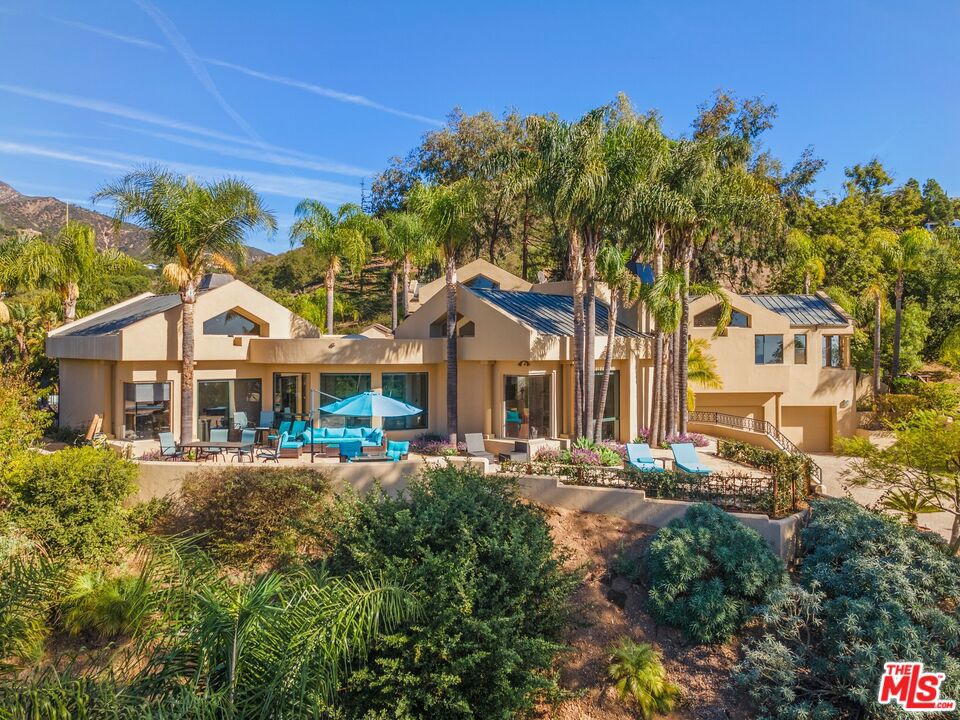 Exclusive retreat on peaceful Hidden Valley Lane in Montecito overlooking the Pacific Ocean, Channel Islands, Coastline, and Santa Ynez Mountains. This estate is convenient and peaceful ideally situated to take in spectacular sunset views and picturesque mountain vistas. The private location is only six minutes to the Upper Village of Montecito. Elegant living in a contemporary home featuring soaring ceilings, rooms flooded in natural light creating an inviting and airy atmosphere to entertain or unwind with family.