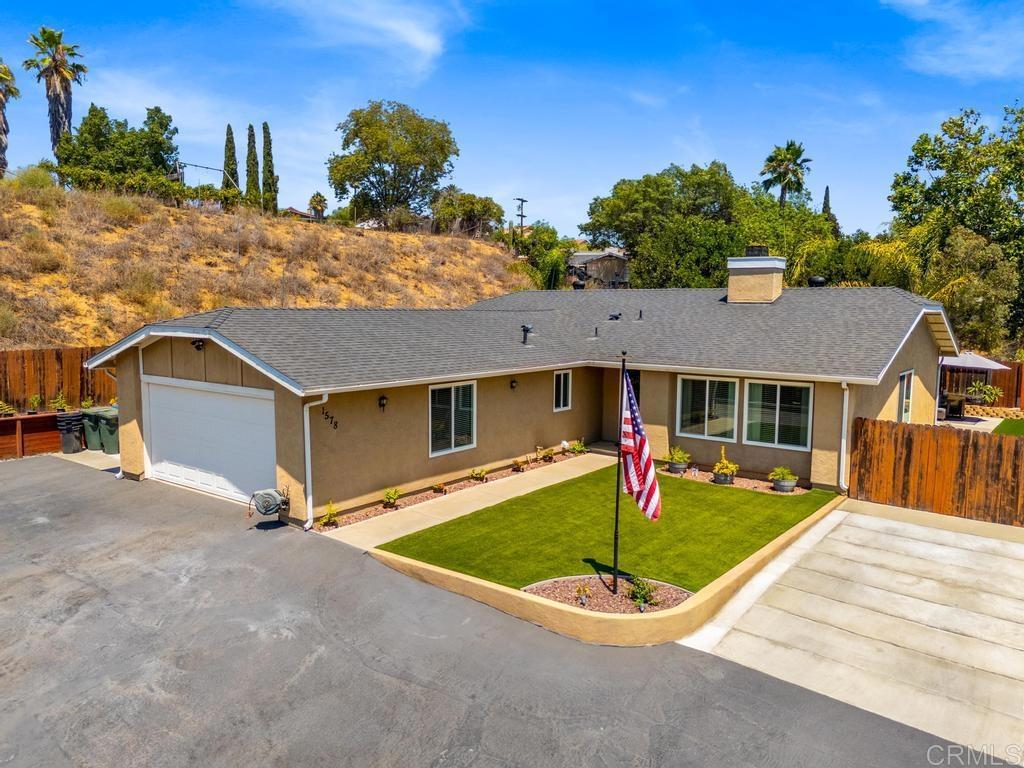 Thoughtfully improved and meticulously maintained. This home is the definition of pride of ownership. The front door opens to a center fireplace surrounded by the living and dining spaces. In the kitchen you will find white shaker cabinets and stainless steel Whirlpool appliances. Throughout this home you will find hard surface seamless flooring, ceiling fans, dimmable recessed lights and neutral soft tones. The spacious primary has its own ensuite bathroom with oversized vanity. Low to no maintenance yard with artificial turf, drought tolerant plants, and hardscape. Peaceful backyard with covered patio and relaxing sound of water running in the pond. Ample storage with the attached oversized garage and separate storage shed. Come see this one before it's too late.