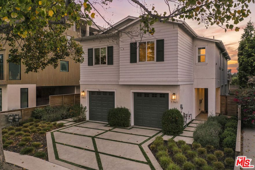 Stunning Newly Built Townhome in Picfair Village. Built in 2023 by renowned Thomas James Homes, this sophisticated duplex-style residence offers the perfect blend of modern luxury and everyday convenience -all with no HOA fees. With only one shared wall, this 4-bedroom, 3-bathroom home feels like a private retreat in the heart of Picfair Village. Venture inside to soaring 9-foot ceilings, wide-plank hardwood floors, and an abundance of natural light throughout the open-concept floor plan. The chef-inspired kitchen is a true centerpiece, featuring a walk-in pantry, quartz countertops, custom island with bar seating, and top-of-the-line Bertazzoni appliances . The spacious living area flows seamlessly through sliding glass doors to a private, fenced backyard perfect for alfresco dining and relaxing under the stars. Upstairs, the serene primary suite boasts a generous walk-in closet and spa-like en suite bathroom with dual sink quartz vanity and a walk-in shower. Three additional bedrooms and a side-by-side laundry area provide comfort and functionality for modern living. Designed with sustainability and technology in mind, the home includes fully owned solar panels managed by the Enphase app, a Bosch heat pump with Ecobee thermostat, a tankless water heater, fire sprinkler system, rainwater capture tanks, and drip irrigation. Tech-forward upgrades include whole-home high-speed data wiring, surround sound, Ring alarm system with camera doorbell, Q app enabled garage door, and motorized window shades by Shade Store. The garage offers tandem parking for two vehicles with EV charging capability. Conveniently located near The Grove, Beverly Hills, Culver City, and some of LA's best dining and shopping, this home is the perfect balance of luxury, comfort, and eco-conscious living.