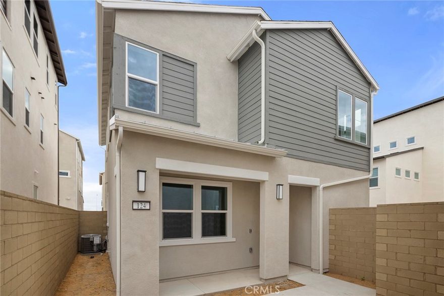 Be the first to call this newly built Lennar home your own! Never before occupied, this modern two-level residence is designed for comfort and contemporary living. With 10-foot ceilings, the home feels open, bright, and airy throughout.



The main level features a spacious entryway and an ensuite bedroom—perfect for guests or extended family. Upstairs, the sun-filled kitchen and living area open seamlessly to a large balcony through expansive sliding doors, creating an effortless indoor-outdoor living experience. The primary suite and an additional bedroom complete the upper level.



High-end finishes include white cabinetry with soft-close doors, white quartz countertops, and stainless steel appliances. Custom shutters and roller shades will be professionally installed in the coming weeks. With solar, an EV charging station, and all appliances included, this home is truly move-in ready!