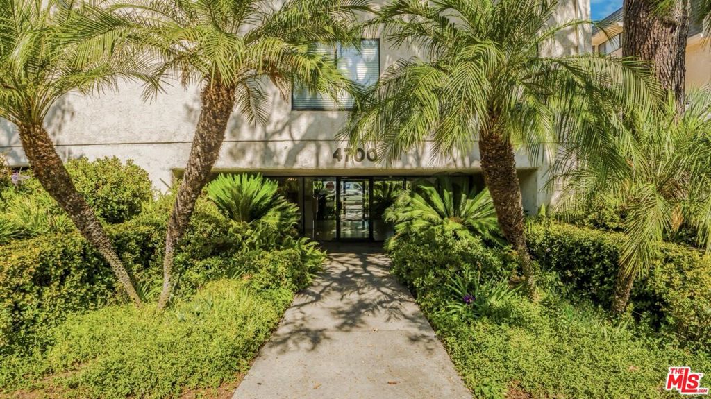 Welcome to your next chapter in this beautifully curated 2-bedroom, 2-bath penthouse condo, ideally located in one of Sherman Oaks' most desirable pockets. This top-floor, end-corner unit offers rare privacy -- no neighbors above, no one next to you on two sides, and no foot traffic passing your front door. With southwest-facing exposure, natural light floods the home throughout the day, creating a bright and uplifting atmosphere. Step inside to an open-concept layout with rich wood-style flooring and fresh, neutral tones that complement any style. The living room and primary bedroom both open to a private balcony where you can enjoy expansive views of the mountains and vibrant sunsets. The spacious primary suite is your personal retreat, featuring generous closet space and direct access to the balcony. The second bedroom is equally versatile ideal for guests, a home office, or whatever your lifestyle demands. Additional highlights include an elevator just steps away, an emergency stairwell next door, and a quiet cul-de-sac street with minimal traffic -- just your neighbors coming and going. The well-maintained community features secure tandem parking, extra storage, and essential HOA coverage that includes hot and cold water, trash, and earthquake insurance -- making homeownership both convenient and stress-free.