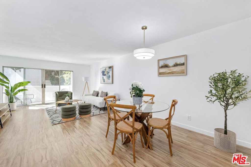 Welcome to your beautifully renovated 2-bedroom, 2-bathroom condo in the highly sought-after Westside Condominiums gated complex of Winnetka! You will find this unit very spacious, offering natural light throughout the home with views overlooking green trees that surround the complex. As you step inside, you'll be greeted by a seamless open layout, and modern finishes. The inviting living room features a covered balcony, perfect for some morning coffee time or to soak in the sunshine of California. Both bedrooms are bright, spacious & include ample closet space. The primary suite boasts a luxurious en suite bathroom complete with a shower/tub combo & a stylish blue & gold storage vanity. The reserved parking space is located right behind the unit for easy access and the complex includes community amenities such as a pool, 3 spas and a clubhouse. This prime location an array of local amenities, including restaurants, schools, coffee shops, entertainment options, and multiple parks. The complex has a community park directly across the street and is centrally located near shopping, transportation, Westfield Topanga Mall, The Village, and Pierce College. The HOA dues included water, trash, gas, and sewer. This turn-key unit won't last! Call us now for your showing!