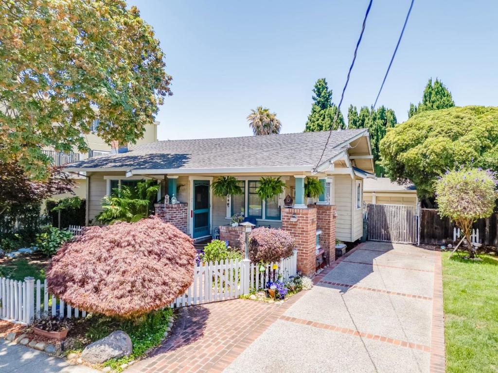 Located in San Mateo's sought-after Eastern Addition neighborhood; this home feels like a gentle embrace - warmly livable, thoughtfully designed, & full of lots of delightful amenities. This home is the perfect suburban retreat with the added bonus of urban convenience. Located within walking distance to bustling downtown San Mateo, this home offers easy access to a vibrant mix of popular shops, renowned restaurants, & lively entertainment options. Downtown Burlingame is also only a mile away. Families will appreciate access to acclaimed schools, while commuters will love the proximity to the San Mateo Caltrain and Highway 101. The curb appeal features a classic white picket fence, blooming flowers, & timeless red brick accents. Inside, you'll find a spacious living room with a cozy fireplace. The floor plan showcases hardwood floors and tall windows that fill the space with natural light, the perfect canvas to make it your own. The accommodating dining room flows seamlessly into the kitchen. The kitchen has all the essentials. The bedrooms are very comfortable, with a lovely primary suite that includes its own bathroom. Out back, you'll find a sunny patio and garage for storage. This charming home has it all; convenience, style, and comfort. Don't wait, things this good go fast!