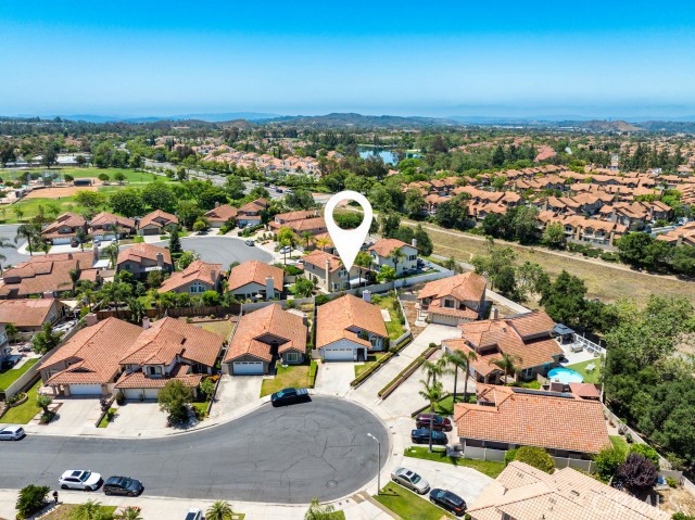 This home has it all single level, rare HUGE 6,375’ lot, cul de sac location & moments to pools, the lake, shopping, dining & more ! This remodeled home sits on a rare 6,375’ cul de sac lot & offers plenty of room to entertain, garden, or relax outdoors with added privacy and space.
Inside, the home offers 3 bedrooms, 2 bathrooms, and 1,566 square feet of well-designed living space. Vaulted ceilings, wood flooring, and abundant natural light create a bright and open feel throughout. The family room includes travertine tile and a granite-surround fireplace, while the kitchen is finished with granite countertops, a travertine backsplash, and newer appliances.
The primary suite features vaulted ceilings, a walk-in closet with built-ins, and a remodeled bath with dual vanities and an oversized shower with custom tile. The two secondary bedrooms include mirrored wardrobes and closet organizers. The interior laundry room and attached two-car garage with storage add everyday convenience.
Located near Trabuco Mesa Elementary, Trabuco Mesa Park, RSM Lake, trails, shopping, and toll roads, this home offers excellent access to local amenities. Rancho Santa Margarita residents enjoy low HOA dues and incredible community perks, including the Beach Club, Lagoon, pools, parks, sports courts, and scenic trails. Recognized as California’s safest city in 2024, it’s a great place to call home.