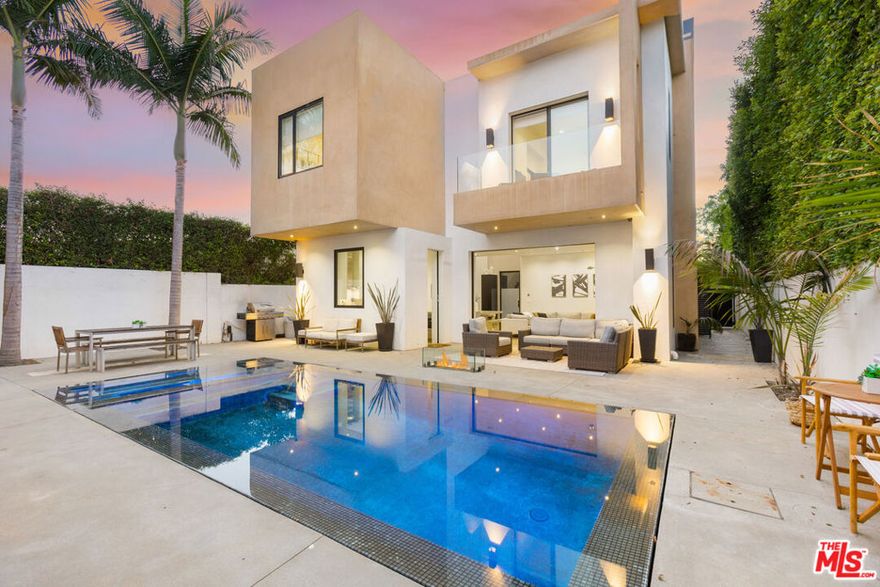 Tucked behind gates for total privacy, this modern home has everything you need to relax, entertain, and enjoy the California lifestyle. Step inside to find vaulted ceilings, skylights, and large windows that flood the space with natural light, creating an open and airy feel throughout. The main house opens up to a peaceful backyard with a sparkling pool, fire pit, and patio area. Your primary suite is one of three bedrooms in the main house and includes two walk-in closets and a luxurious bathroom. Past the pool, you will find a detached two-story guest house. The first floor is an open studio-style space that works great as a pool lounge, gym, or office, while the upstairs has a one-bedroom, one-bathroom unit complete with kitchen and living space. Modern, private, and fully furnished  this home is move-in ready.