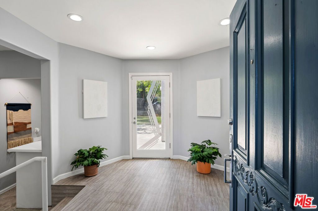 Photo of 23246 Canzonet Street, Woodland Hills, CA 91367 (MLS # 25573901)