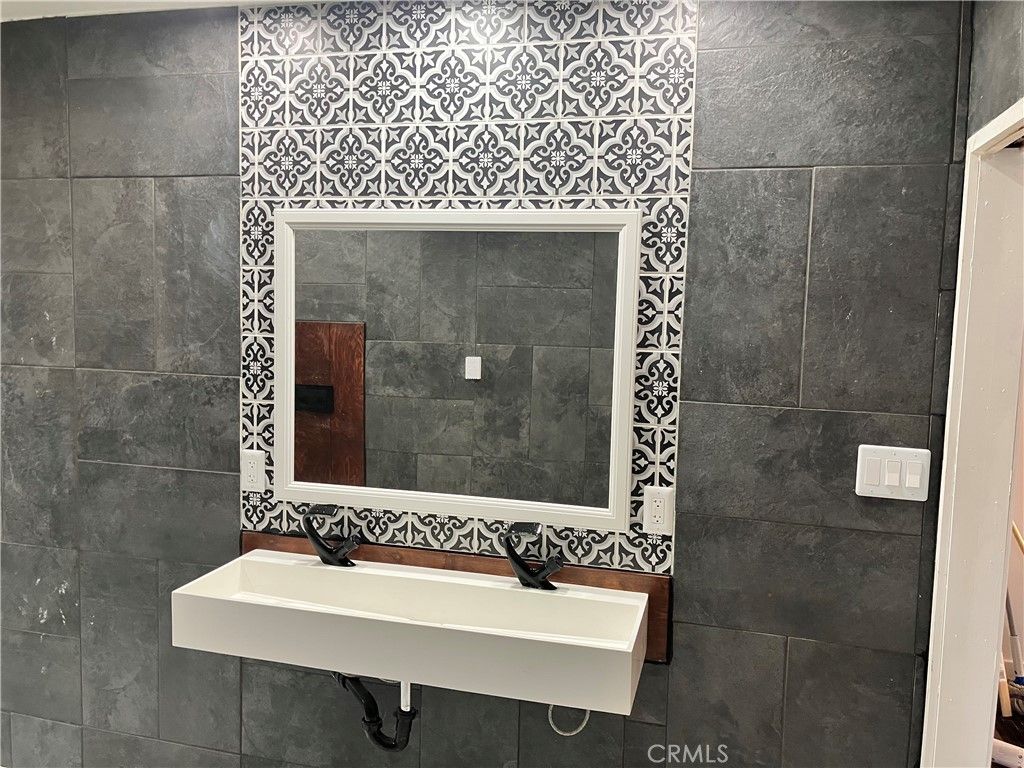 Photo of 1818 W 81st St, Los Angeles, CA 90047 (MLS # OC25246463)