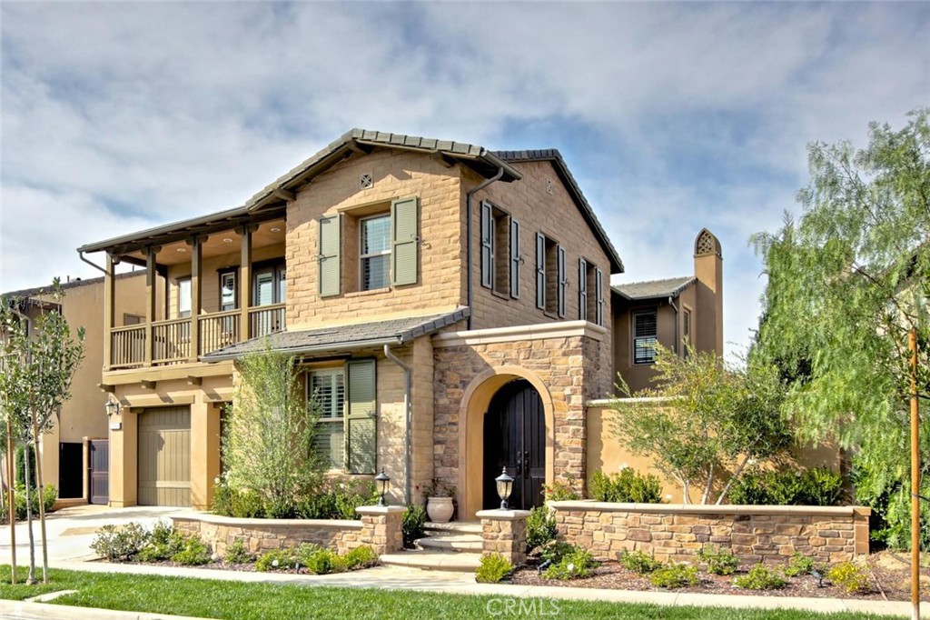 Immaculate 4BR + Den + Bonus Room in Prestigious Portola Springs < One of a kind opportunity in the highly desirable community of Portola Springs! This stunning unfurnished residence features 4 bedrooms, 4 bathrooms, a den, and a spacious bonus room, offering an exceptional blend of luxury and functionality. Step through a grand courtyard entry adorned with a tranquil water wall and cozy fire table—perfect for welcoming guests or enjoying a serene evening outdoors. Inside, the open-concept main level is designed for both elegance and everyday comfort, showcasing Italian hardwood flooring, a formal dining room, great room, conservatory, and a convenient downstairs bedroom and bath. At the heart of the home is the gourmet kitchen, boasting an oversized granite island, upgraded cabinetry, GE appliances, and a GE Monogram built-in refrigerator—a dream space for any home chef. Upstairs, you'll find plush carpeting throughout, a luxurious master suite with partial mountain views, a bonus room, and two generously sized secondary bedrooms, each with walk-in closets and ensuite baths. One of the bedrooms opens to a spacious front-facing balcony, ideal for morning coffee or sunset views. The spa-inspired master bath features natural stone finishes and custom-framed mirrors, creating a peaceful retreat. Outside, the private, tree-lined backyard is an entertainer’s paradise—complete with a built-in BBQ island, outdoor kitchen, water fountain, gas fireplace, covered dining area, and custom outdoor lighting for evening gatherings. Residents enjoy access to resort-style amenities, including pools, spas, clubhouse, BBQ areas, tennis and basketball courts, playgrounds, and expansive greenbelts. Located within the award-winning Irvine Unified School District and just minutes from The Spectrum, The District, John Wayne Airport, and a variety of shops and dining. No smoking. No pets.