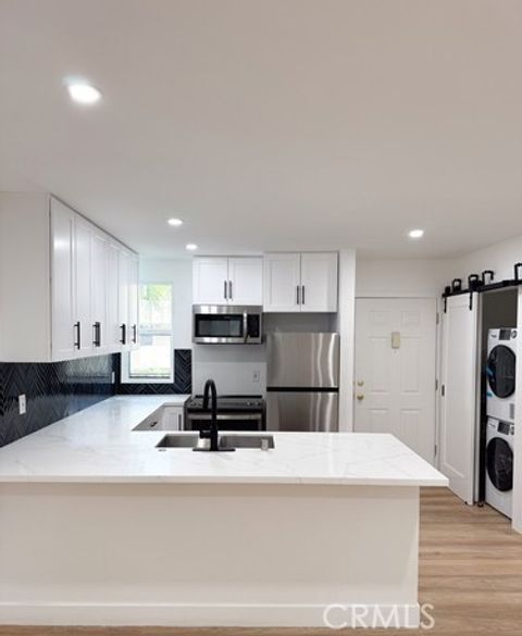Photo of 17000 Burbank Boulevard #202, Encino, CA 91316 (MLS # SR25181273)