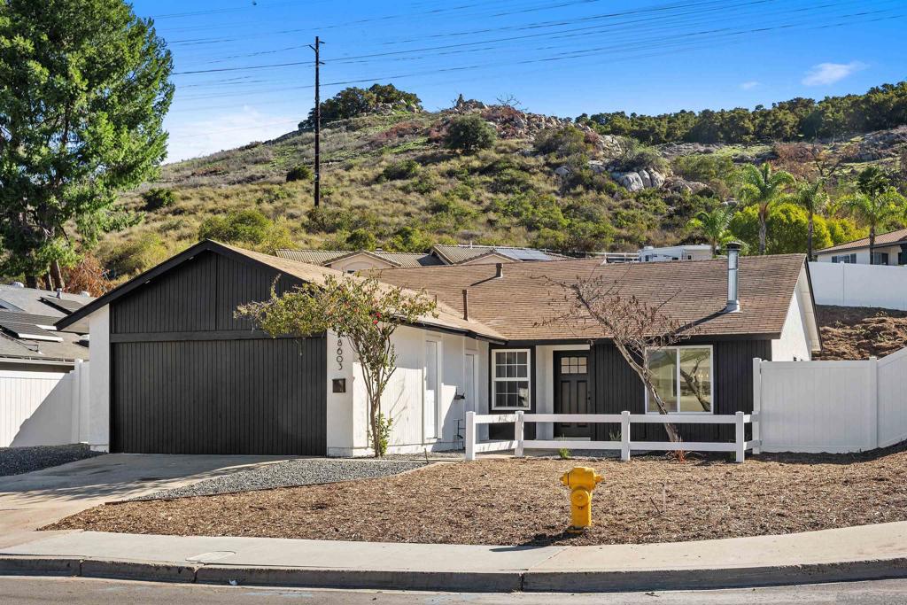 Welcome home to this this newly upgraded single-family home located in the Johnstown neighborhood of El Cajon. 8603 Cordial Road 92021, offers spacious living inside and out in a highly sought out neighborhood. Built in 1974, the home features 4 bedrooms and 2 bathrooms within its 1,372 sq feet while the converted garage space is an added bonus room waiting for your imagination. The oversized corner lot is 8,800 square foot surrounded by a newly built vinyl fence, giving the home plenty of outdoor space waiting for you use this blank canvas. The Corner lot and side yard offers extra parking and room for all of your toys! This home offers a spacious living area, wood burning fireplace, new windows, flooring, baseboards and brand new kitchen counters, cabinets, and Appliances! The well-sized bedrooms and bathrooms are situated perfectly , with the Primary having an en-suite bathroom and a hall bathroom to serve the household. The City of El Cajon is the perfect suburban neighborhood, with privacy all while being close to local amenities, schools, stores and parks.