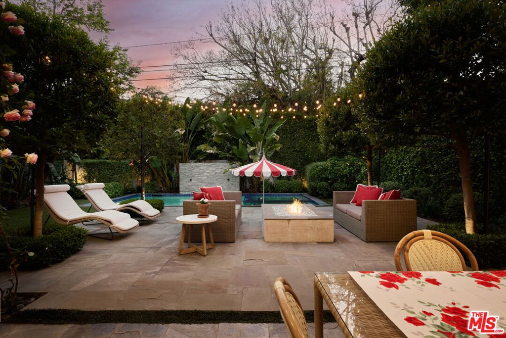 Photo of 361 N Bowling Green Way, Los Angeles, CA 90049 (MLS # 25536413)