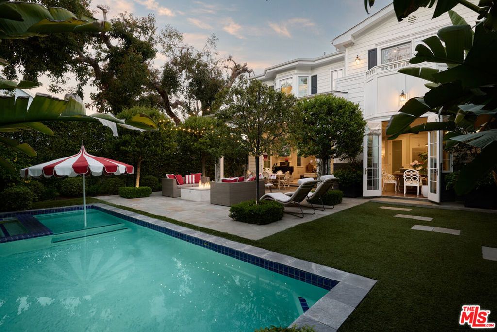 Photo of 361 N Bowling Green Way, Los Angeles, CA 90049 (MLS # 25536413)