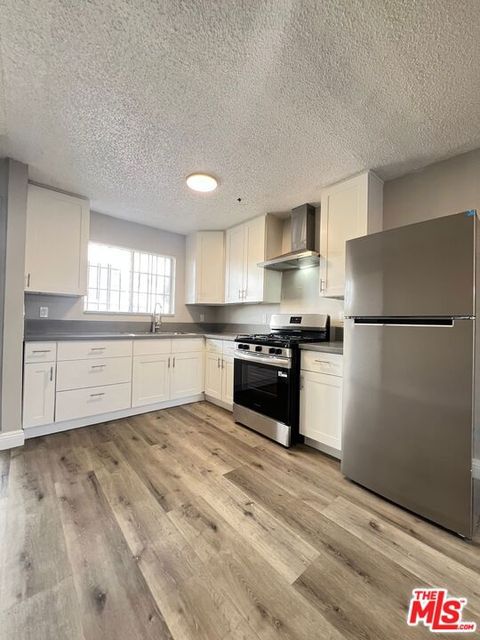 Photo of 8307 S Figueroa Street #C, Los Angeles, CA 90003 (MLS # 26642447)
