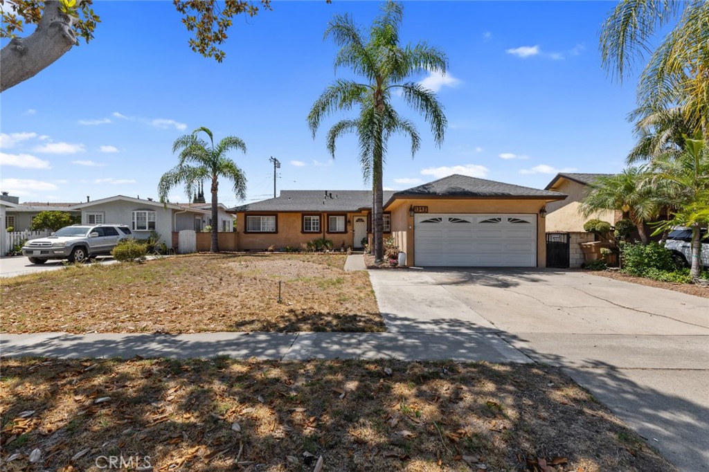 Gorgeous Remodeled Home in Fullerton – Turnkey & Move-In Ready
Welcome to this beautifully remodeled single-level home located in the prestigious city of Fullerton. This 3-bedroom, 2-bathroom property offers approximately 1,290 sq ft of living space on a spacious 6,600 sq ft lot. The open floor plan is filled with natural light from numerous double-pane windows, complemented by elegant new laminate flooring throughout.
The upgraded kitchen features granite countertops, custom cabinetry, stainless steel appliances including a gas cooktop, oven, microwave, and dishwasher, plus a breakfast bar and separate dining area. The living room provides seamless access to the large backyard—ideal for entertaining and outdoor living.
Both bathrooms have been tastefully remodeled with modern tile finishes. All bedrooms are generously sized and include ceiling fans and ample closet space. Additional features include a 2-car garage with epoxy flooring and finished walls—perfect for a home gym or workshop—central AC/heat, recessed lighting, and laundry hookups.
Enjoy a private backyard with lush landscaping and mature fruit trees: mango, pomegranate, loquat, and fig. Located near top-rated Fullerton schools, Downtown Fullerton, parks, dining, shopping, and with easy access to the 91 and 5 freeways.
This is a rare opportunity to own a move-in ready home in one of Fullerton’s most desirable neighborhoods.