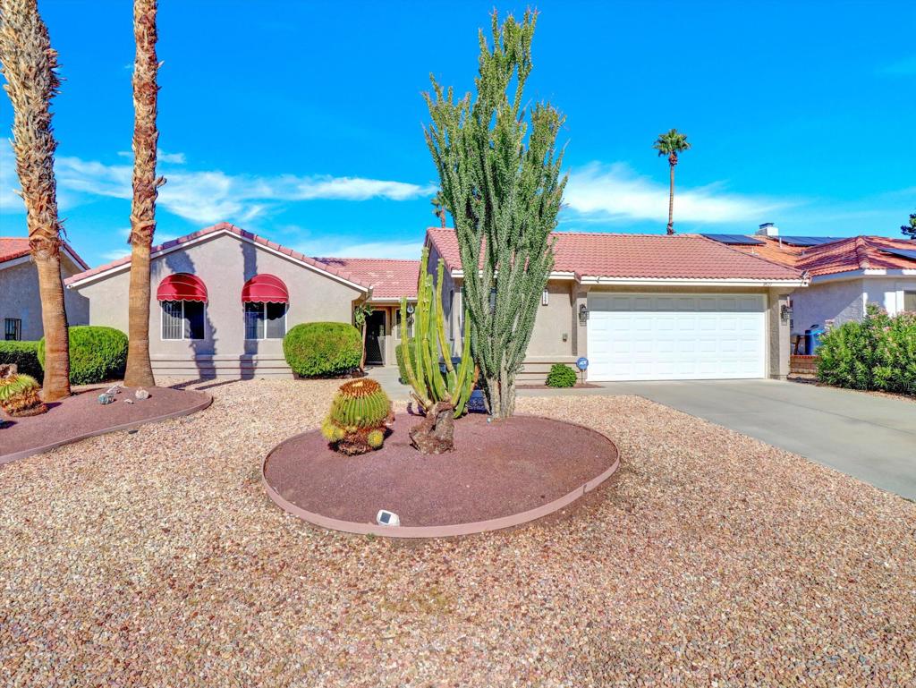 Very nice three bedroom two and 1/2 bath home on the 14th green in Mission Lakes Country Club This home offers a brand new A/C unit purchased and installed at 25K. The home is well maintained with a spacious living area including kitchen and dining and has two large sliders that lead to the back yard. The master bedroom has a slider off to the back patio and a large walk in closet and tub. There is a fully covered patio, a fire pit area and the views of the mountains from the back yard are spectacular. You can enjoy evenings watching a beautiful sunset after playing a round of golf on an 18 hole Ted Robinson Championship golf course. Mission lakes has many amenities like heated pool, spa, tennis, fitness center, clubhouse, pro shop, restaurants and so much more. Vacation like living at its best. The best thing is the Low HOAS of only 465 a month and 600 a year to be spent for food. The 465 includes unlimited golf for two on title!