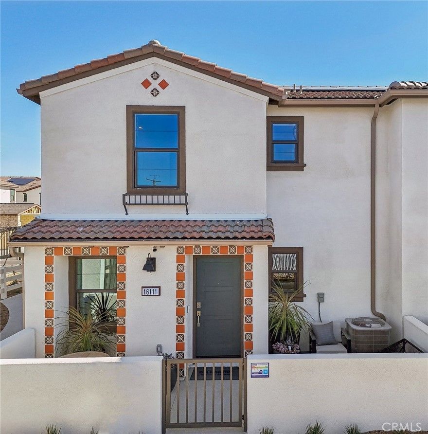 NEW CONSTRUCTION - NEW COMMUNITY! QUICK MOVE HOME! Welcome to Citrus Lane, an upcoming townhome community located in the city of Fontana. Citrus Lane features two-story townhomes ranging from 1,500 to 1,602 sq. ft. with up to 4 bedrooms and 2.5 bathrooms.  This Residence 1602 plan features 4 Bedrooms and 2.5 Baths, a spacious open-concept Great Room, Kitchen and Dining Area designed for gathering and perfect for entertaining friends and family.  The gourmet Kitchen offers stainless-steel appliances including cooktop, dishwasher, and microwave/hood and quartz kitchen countertops. The second level features a thoughtfully-designed layout, offering spacious bedrooms, convenient laundry room and bathrooms with dual sink vanities. Among the features and finishes, homeowners will appreciate the unparalleled peace of mind in owning America’s Smart Home, Home is Connected. The Home is Connected package offers devices conveniently controlled from one application to stay connected to home around the clock.