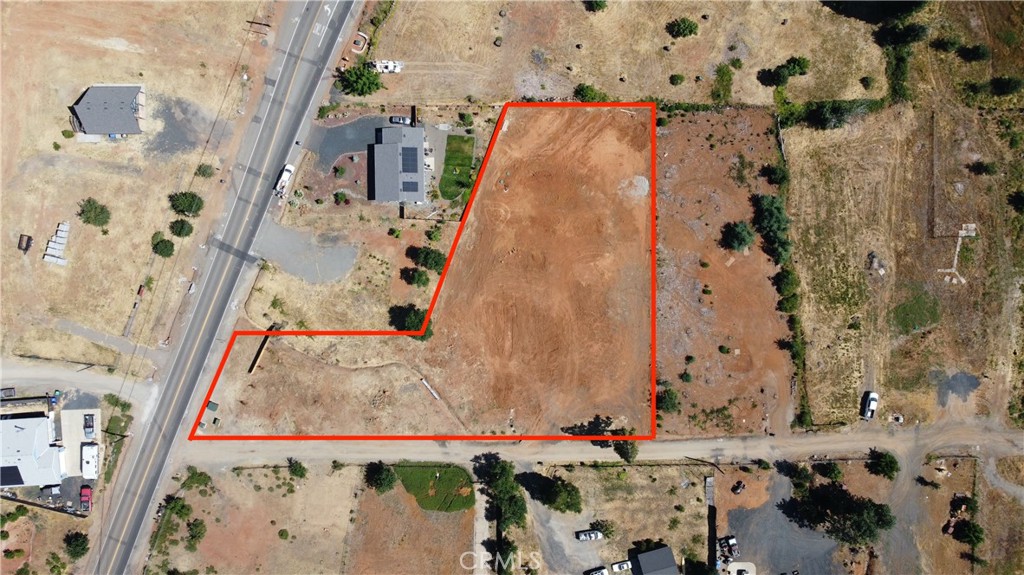 Here's the one you have been waiting for! This huge building lot is 1.09 acres with active PID, backflow installed, brand new septic tank and leach field and survey completed. The previous home was 5 bedrooms, 3 bathrooms and featured 2,559 sqft. The system has been replaced and sized for a 3 bedroom home. There is a gentle upslope from the road and the home site sits far back from Clark Rd. This is a wonderful setting in Upper Paradise in a nice and quiet neighborhood.