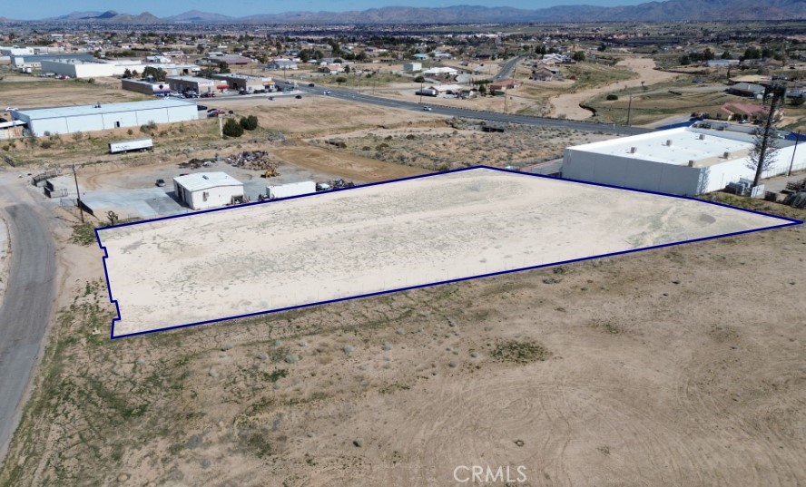 ±1.89 acres of prime industrial land situated in the vibrant heart of Hesperia's industrial hub, located on G Avenue. The property is zoned I1 - Limited Manufacturing, offering a versatile range of light manufacturing and industrial uses. Essential utilities are readily available, with a 12" water line running in G Avenue and a sewer line conveniently located along the eastern boundary of the site. This parcel represents a valuable opportunity for investors or companies looking to establish or expand their operations in a strategically positioned and well-serviced industrial zone. Buyer to verify all information contained herein.