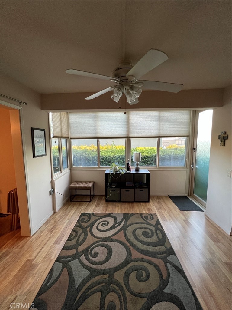 Wonderful ground floor condominium in the Huntington Landmark community. This spacious 2 bedroom, 2 bath home includes a detached, single car garage and plenty of parking for both residents and their guests. This model features an enclosed atrium with laundry closet (for full sized washer and dryer), laminate flooring, and spacious living areas. The community offers many amenities, including gated and guarded entry, tennis and pickleball courts, heated pools, gym and weight room, library, and a range of activities for the residents.