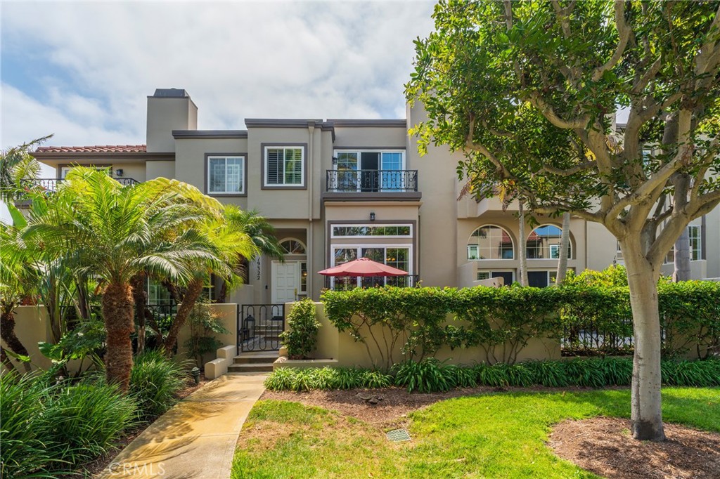 Welcome to this is beautifully remodeled townhome nestled within the prestigious Seacliff on the Green, a sought after gated community in Surf City. The property boasts 3 bedrooms, 2.5 baths, and approximately 2,065 sqft of living space. it offers upscale coastal living with refined finishes. Open concept living on the main level featuring gorgeous wood flooring, a romantic fireplace in the living room, and a well-positioned dining area that overlooks a private patio.The custom remodeled kitchen showcases high-end cabinetry and granite countertops, opening to a cozy family room with access to an upper balcony .Luxurious master suite with dual walk-in closets and a spa-style en-suite bath fitted with natural stone, a soaking tub, a walk-in shower, dual vanities, and abundant natural light.Located in the sought-after, gated and guard-patrolled community, this home offers peace of mind and resort-style amenities including a sparkling community pool and spa, facing a serene greenbelt with waterfall features. Just a short stroll from the beach (less than ¼ mile) and with proximity to Pacific City, Main Street shops & top-rated restaurants, this charming home is the ultimate relaxed beachside living resort life experience all year around!!!