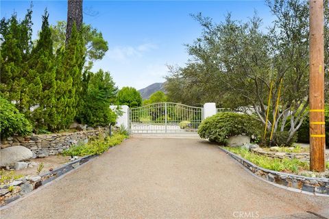 Photo of 821 Melody Lane, Lytle Creek, CA 92358 (MLS # CV26095793)