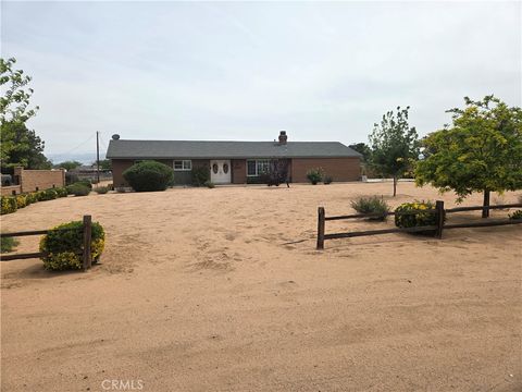 Photo of 13955 IROQUOIS Road, Apple Valley, CA 92307 (MLS # HD26076678)