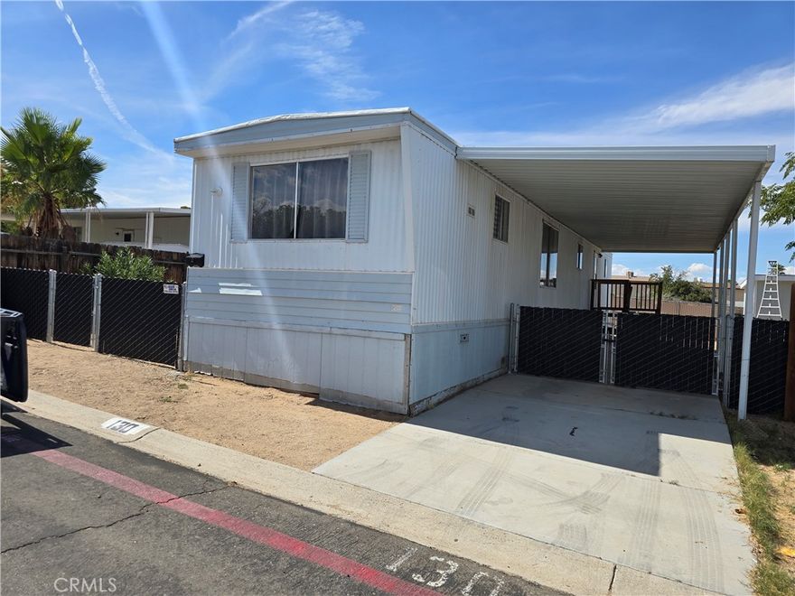 Welcome to Sunrise Pass Estates Community with low land lease.  Charming 2 bedroom 1 bath home ready for your family to enjoy.  Priced just right for the starter family home.  There is laundry hook up inside home, fenced in yard and carport for 2 cars.  The community offers a pool and laundry service center as well as a club house.  Call today to easily see this lovely home.