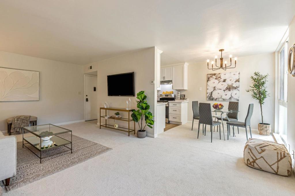 Step into this beautifully renovated top floor 2-bedroom, 1-bathroom condo in the heart of Mountain View. Located in a secure building, Unit 307 has been refreshed from top to bottom, featuring brand-new carpet, baseboards, freshly painted walls and ceilings, an all-new kitchen with LVP floors, a stylish bathroom vanity, reglazed bathtub, and matching modern flooringcreating a bright, move-in-ready space. Inside, you'll find 1,008 square feet of thoughtfully designed living filled with natural light, enhanced by energy-efficient Low-E windows. The spacious living room flows into a dedicated dining area and opens to a peaceful balcony, ideal for morning coffee or relaxing evenings. The kitchen boasts sleek cabinetry, quartz countertops, and a modern electric range for everyday cooking. Residents enjoy community amenities including a sparkling in-ground pool, convenient laundry, and gated, assigned parking. The HOA fee covers all major utilities: electricity, gas, and water. Located within the acclaimed Los Altos Elementary and Mountain View / Los Altos High School Districts, this home combines modern comfort with access to top-tier education. Dont miss this turnkey opportunity in a prime Silicon Valley location!