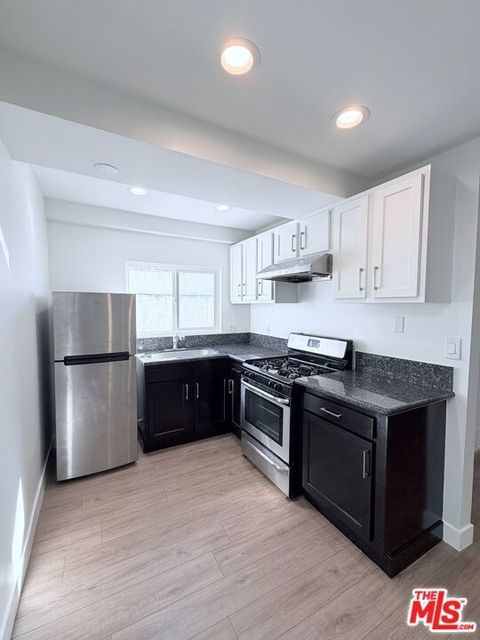 Photo of 8610 Cadillac Avenue #8608, Los Angeles, CA 90034 (MLS # 25593377)