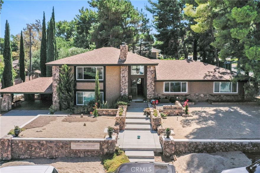 Location is everything! Tucked near the pine tree covered foothills of Quartz Hill is this original custom built HOUSE PLUS FULL SIZED APARTMENT! Welcome to this spacious and well-loved pool home, brimming with character and opportunity! This multi-level gem has been thoughtfully maintained by the same owners for years and is ready for its next chapter.

As you step inside, you’ll appreciate the generous floor plan, natural light pouring through oversized windows, and the timeless mid-century architectural details that give the home its unique charm. Multiple levels provide privacy and flexibility—perfect for creating separate living zones, a home office, or guest quarters.

The home’s solid bones and classic design offer an excellent canvas for modern updates, allowing you to add your personal touch while building equity. Original features, including built-ins and vintage finishes, bring a warm sense of nostalgia and craftsmanship not often found in today’s builds.

Outside, the property boasts a mature landscaped yard ideal for gatherings, gardening, or simply enjoying peaceful afternoons. The elevated lot and multi-level design provide privacy and a sense of retreat while still being conveniently close to schools, parks, and shopping.

Property Highlights: Supplement files attached with floor plans, includes dimensions but does not include the attached apartment.

Private pool and built-in Barbeque. 

NO HOA.

Room for Rv and Boat Parking in rear of property. 

Spacious multi-level residence with timeless character

Full-sized 1-bedroom apartment on lower level with private entrance — ideal for income or multigenerational living

Light-filled interior with generous living and entertaining spaces

Mid-century details, built-ins, and solid craftsmanship

Flexible floor plan with room for home office, guests, or hobbies.

A rare find — versatile, elegant, and full of potential. Don’t miss this chance to own a multi-use property in a highly sought-after location.

This is more than just a home—it’s a rare opportunity to own a spacious, character-filled property in a desirable neighborhood. With its unbeatable potential, flexible layout, and solid construction, this home is ready to shine again.