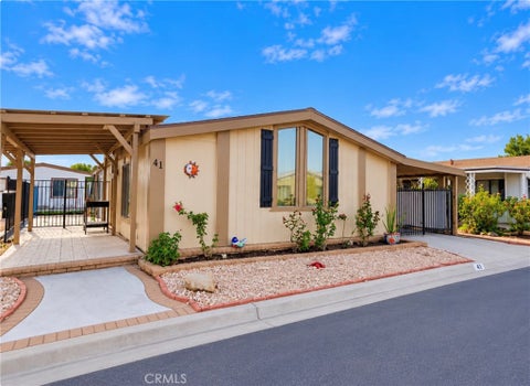 Photo of 13381 Magnolia Avenue #41, Corona, CA 92879 (MLS # IG26232290)