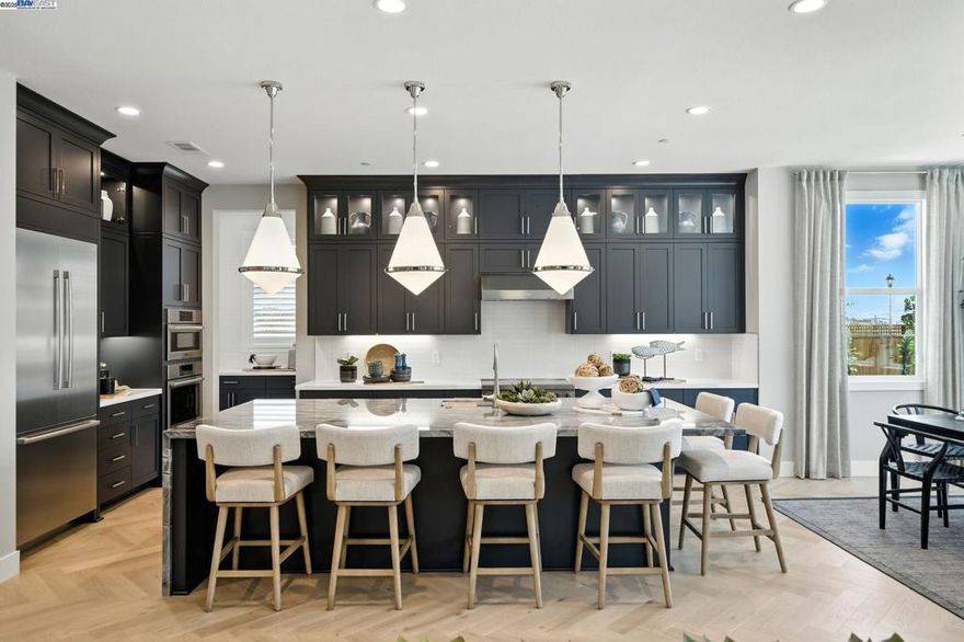 Stunning New Construction Home in the sought-after Francis Ranch master planned community! Welcome to this breathtaking, new home, perfectly situated near all shopping and major freeways. The elegant Residence 3 layout combines style and functionality for contemporary living and entertaining.  Buyers will love the upgrades, including laminate flooring, stylish kitchen countertops, cabinetry, and enhanced electrical options—check with your Community Sales Manager for details. An energy-efficient solar system is also available for purchase or lease, ensuring savings and sustainability for your new home.  Enjoy the convenience of being a short stroll away from two neighborhood City parks and trails, as well as a short drive to any shopping you could need, BART, freeways, and so much more!  Seize this opportunity to make this exceptional property your dream home! Nice, spacious size lot with over 20’ deep by 65’ wide. Very spacious lot and the home is not far from the future Francis Ranch Northern Park to relax in. Solar can be leased or purchased.  Representative photos added.