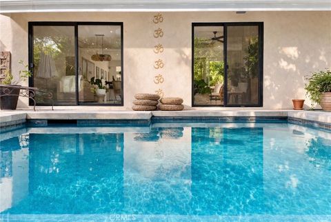 Photo of 4709 Dunman Ave, Woodland Hills, CA 91364 (MLS # PW26067347)