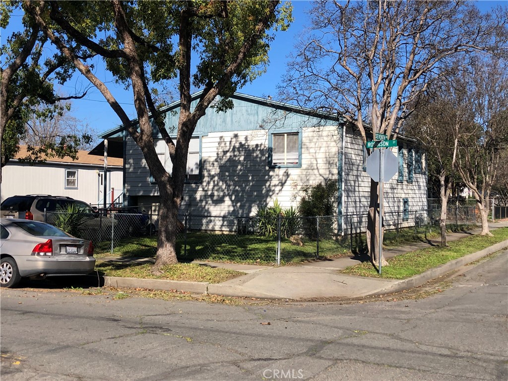 Two houses for the price of one on one oversize corner lot! The original house (680) was built in the 1920's with raised floor construction with 2-3 bedrooms and 2 baths configuration. The second house (676 Robinson) is a newer 2 bedroom 2 bath doublewide on permanent foundation and it's own utilities. There is also an oversize detached garage with potential for an addition adu while still retaining 2 car garage parking and double driveway accessible from 7Th St. Entire property has perimeter chain link fence with divider between 676 and 680. This property would be great for either investor or owner looking for passive income.