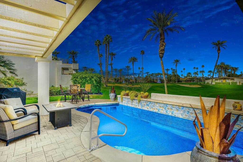 Price Adjustment! Furnished~Pool~Fairway Views~Updated! Experience Desert Living in this Elegantly Updated, Pool home. A popular Troon model offers a spacious and bright open floor plan, bathed in natural light. Meticulously updated with modern finishes; encompassing new heat pumps, all new Milgard Windows and Sliders, modern Lighting, automated Blinds, and plush new Carpeting. The well-designed layout is perfect for Entertaining with a formal Living Room with a beautiful Slate wall Fireplace mantel as the focal point and Dining area that flows seamlessly into a comfortable Family Room complemented by a Wet Bar. The Chef's Kitchen features a large butcher block Island, custom cabintery, Quartz Counters, Stainless Steel Appliances, all looking out to the Views. The Primary Suite is a private sanctuary with picturesque Views, a large walk-in closet, a freestanding tub and walk-in shower. The 2nd Suite provides an en-suite Bath, walk in closet and private patio access. 3rd Guest Room offers a Murphy bed and an office desk, versatile space for Guests or a Home Office. Relax and unwind on the expansive patio complete with a private Pool and stunning Views of the 8th Green, Fairway and beyond. The landscaped yard and inviting entry courtyard add to the home's charm. Enjoy the added benefits of a solar system & upgraded insulation for reduced energy costs. A 3 Car air-conditioned Garage completes the home. Don't miss the opportunity to own this exceptional desert retreat!