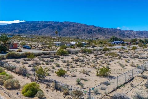 Photo of 74552 Foothill Drive, 29 Palms, CA 92277 (MLS # JT26039358)