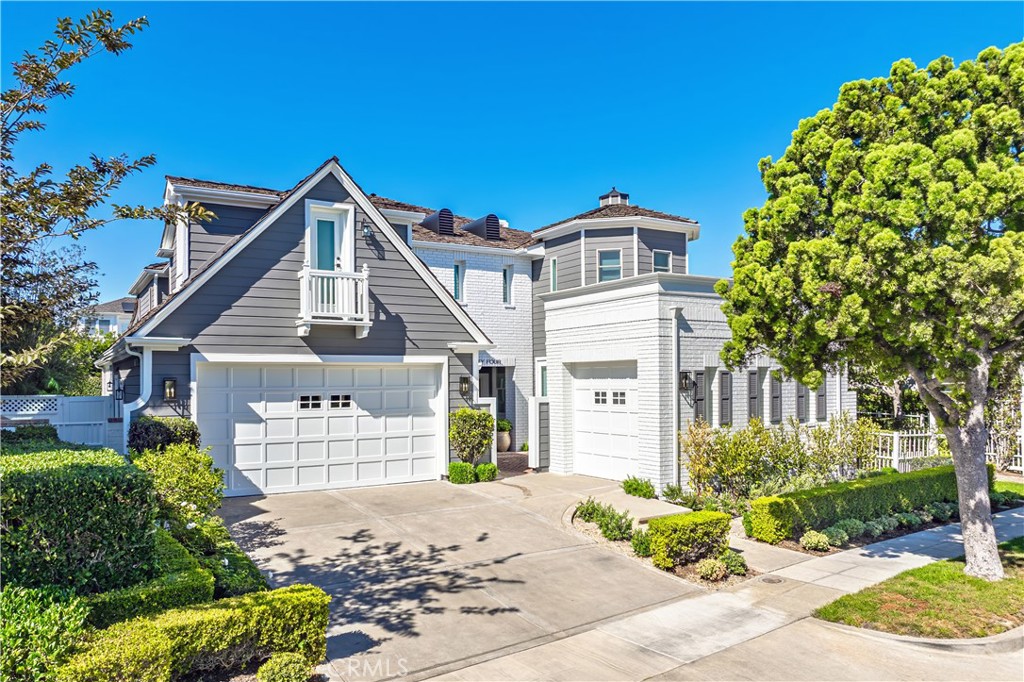 Nestled in the highly sought-after gated community of the Castaways in Newport Beach, this beautifully updated 4-bedroom, 3.5-bathroom home offers an exceptional blend of luxury and comfort. A front courtyard welcomes you to a charming Dutch door entry, setting the tone for the inviting interiors. Inside, the formal living room with a cozy fireplace and an elegant dining room provide the perfect setting for entertaining. The chef’s kitchen is a culinary delight, featuring quartz countertops, stainless steel appliances, a center island, and a breakfast nook. The kitchen seamlessly flows into the spacious family room with a fireplace, creating an ideal space for gatherings. French doors lead to a beautifully hardscaped backyard, complete with pool and spa—an outdoor oasis perfect for relaxing or entertaining. The main floor boasts an en-suite bedroom, a powder bath, and a convenient laundry room. Upstairs, the expansive primary suite is a private retreat with its own fireplace, built-ins, and a balcony overlooking the serene backyard. The spa-inspired primary bath offers dual vanities, a soaking tub, a walk-in shower, and a generous walk-in closet. Two additional bedrooms, a well-appointed bathroom, a large loft, and a private office complete the upper level. Tastefully updated with wood floors, designer tile, and a neutral color palette, this home exudes timeless elegance. Located just steps from scenic Back Bay trails and local dining, this Castaways gem offers the best of Newport Beach living.