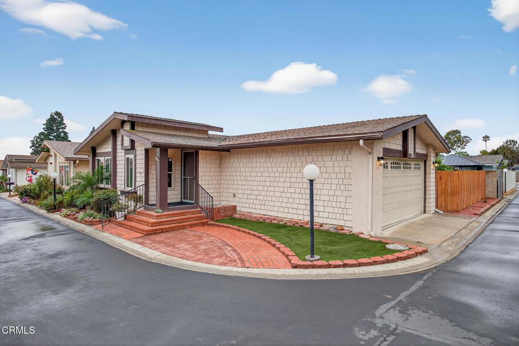 Welcome to Rancho Ventura, a sought after 55+ gated community where affordability meets comfort and convenience. This completely detached manufactured home comes with the land, offering one of the best values in Ventura with a low HOA of just $360 per month. The home features a spacious two-car garage and a private yard, creating the perfect blend of independence and security. Inside, you'll find high ceilings and thoughtful upgrades throughout. The kitchen showcases newer quartz countertops, freshly painted cabinetry, and a custom tile backsplash. The generously sized primary suite includes a walk-in closet and a beautifully remodeled bathroom. Additional highlights include dual-pane windows, a private indoor laundry room, upgraded door hardware, and a recently serviced central A/C to keep you cool year-round. The HOA provides peace of mind and a resort-style lifestyle with access to a sparkling pool, relaxing hot tub, clubhouse, billiard room, greenbelts, RV parking, and more. Utilities such as basic cable, water, trash, and sewer are also included. Conveniently located near shopping, the Ventura County Government Center, and with easy access to the 101 and 126 freeways, this home combines comfort, affordability, and an unbeatable location.
