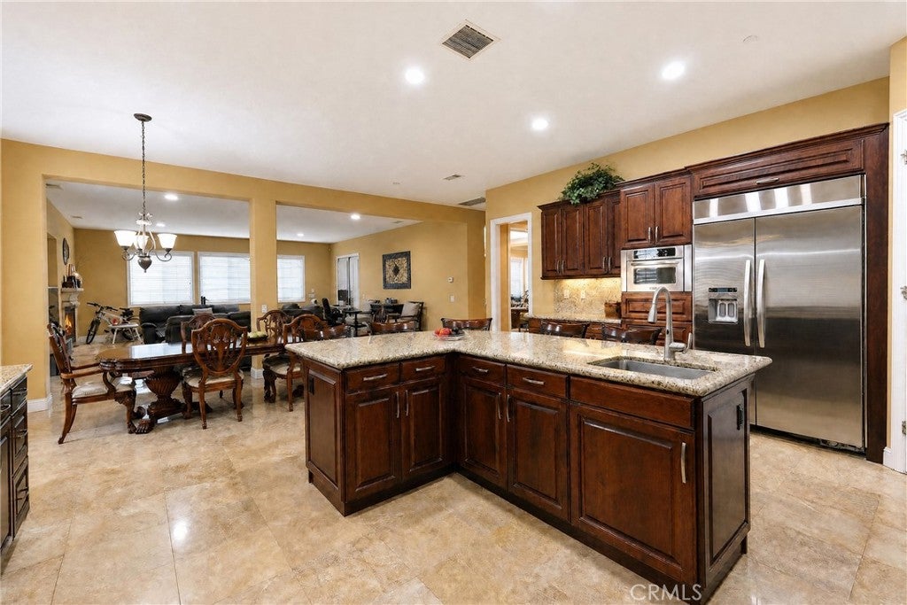 Photo of 1115 Maravilla CIR, Corona, CA 92881 (MLS # TR26224114)