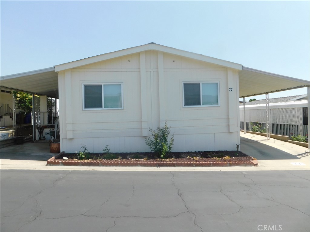 $$$ Reduced $$$ ~GORGEOUS HOME REMODELED TO PERFECTION~LOCATED IN YUCAIPA'S HIGLY REQUESTED FAMILY PARK OF EXECUTIVE MOBILE ESTATES...LOW SPACE RENT ONLY $529~FEATURES AND UPGRADES INCLUDE...PAINTED EXTERIOR IN 2024 WITH TOP OF THE LINE REFLECTIVE PAINT, RECENTLY LEVELED BY CAL-STAR MOBILE HOME CONSTRUCTION CO. SELLER PAID $10,000 WHICH INCLUDED LEVELING UNDERNEATH PLUS BOLTING TOGETHER ON THE ROOF AT THE RIDGE LINE, PAINTED INTERIOR IN 2020 INCLUDING THE CEILINGS, NEW DUAL PANE WINDOWS(MINUS KITCHEN/DINING ROOM), NEW WATER HEATER IN 2023, BEAUTIFUL VINYL FLOORING THROUGHOUT IN 2018, KITCHEN/LAUNDRY ROOM FLOORING IN 2020, KITCHEN BACKSPLASH IN 2020, NEW COOKTOP AND OVEN IN 2022, SOLID CORE FRONT DOOR PLUS NEW SCREEN DOOR!~HUGE LIVING ROOM WITH WOOD BURNING FIREPLACE, CATHEDRAL CEILINGS PLUS CEILING FAN~BRIGHT KITCHEN WITH CABINETS AND COUNTER SPACE GALORE PLUS BREAKFAST BAR AND PANTRY..MICROWAVE INCLUDED~FULL SIZE DINING ROOM~KING SIZE MASTER BEDROOM WITH LARGE WALK-IN CLOSET~LARGE MASTER BATH WITH BOTH GARDEN TUB & SEPARATE SHOWER WITH ENCLOSURE~ENCLOSED CALIFORNIA ROOM IS ACCESSIBLE OFF THE MASTER BEDROOM AND THE LIVING ROOM WITH A CLOSET IN THE MIDDLE...IT'S CURRENTLY SET UP AS A WORKOUT ROOM OFF OF THE MASTER BEDROOM AND A GAME ROOM OFF THE LIVING ROOM...COULD EASILY BE USED AS A 3RD BEDROOM~THE GUEST BEDROOM IS AT THE OPPOSITE SIDE OF THE HOUSE~GUEST BATH HAS A FULL SIZE SHOWER WITH ENCLOSURE~H U G E LAUNDRY ROOM SPACIOUS ENOUGH FOR ALL THE EXTRAS OR COULD EASILY BE USED AS AN OFFICE AREA AS WELL~INVITING AND PRIVATE FRONT PORCH~PERFECT SIZE BACK YARD~2 SHEDS~2-3 VEHICLE CARPORT~***CALL FOR A TOUR, YOU WILL DEFINITELY BE IMPRESSED***