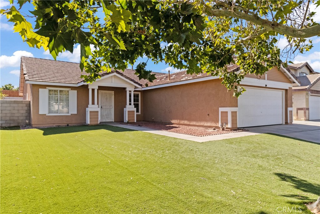 Spacious single-story home with a versatile floor plan and timeless style. This 3-bedroom, 2-bathroom residence features a formal
living room with a fireplace and a spacious family room, offering multiple areas for everyday living and entertaining. The open kitchen flows seamlessly into the living spaces, creating a functional and comfortable layout. A durable tile roof provides lasting quality and low-maintenance appeal. Generously sized bedrooms and well-appointed bathrooms accommodate a variety of needs. Conveniently located near shopping, dining, parks, schools, and major commuter routes, this home combines classic design with modern convenience.