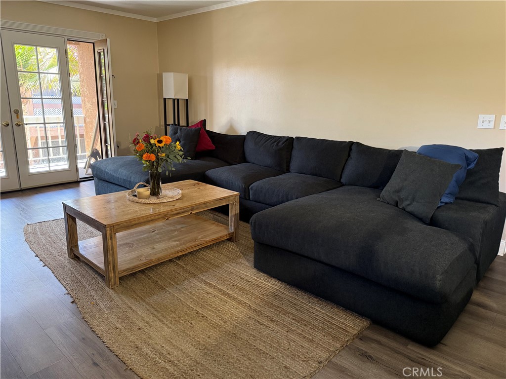 You will love this beautiful Villa Warner condo with 2 large bedrooms and 2 full remodeled baths! Updated upper end unit close to pool and clubhouse. Rare TWO covered parking spaces, numbers 84 and 85, are included very close to the unit. Spacious living room has a gas fireplace, and French doors leading to your balcony, to enjoy a lovely coastal breeze! Dining area just off bright and open remodeled kitchen. Storage unit is located on same floor as unit. The HOA provides a pool, spa, gym, bbq area, laundry facilities, greenbelts, and clubhouse with a billiard room. The HOA also covers gas, water, and trash. Dog Friendly! The gated community is minutes from the beach, freeways, and shopping malls, making it the perfect place to call home!