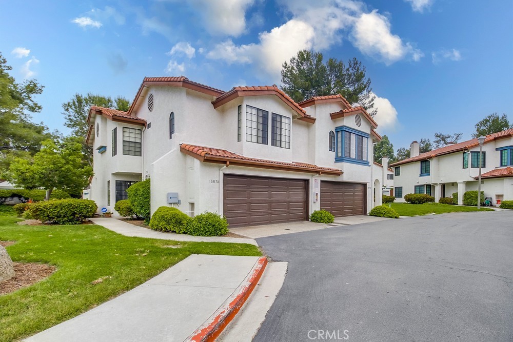 Welcome to 1567 Apache Dr #A – a beautifully maintained end-unit townhome nestled in the desirable Charter Point community of Chula Vista! This spacious 3-bedroom, 2.5-bath home offers an ideal blend of comfort and functionality. Step inside to find vaulted ceilings, abundant natural light, and a cozy fireplace in the living room. The updated kitchen features granite countertops, stainless steel appliances, and plenty of cabinet space—perfect for entertaining or everyday living. Upstairs, the generously sized bedrooms include a primary suite with dual closets and a private ensuite bath.
Enjoy indoor-outdoor living with a private patio ideal for relaxing or BBQs, plus an attached 2-car garage with laundry hookups. The community offers resort-style amenities including a sparkling pool, spa, and beautifully landscaped greenbelts. Located near top-rated schools, parks, shopping centers, and major freeways, this home is a rare find in one of Chula Vista’s most convenient neighborhoods.