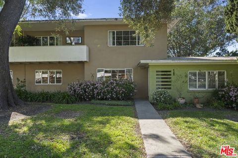 Photo of 5345 Village Grn, Los Angeles, CA 90016 (MLS # 26661487)