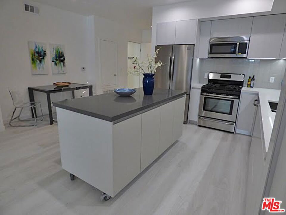 FIFTEEN26 Armacost, a New complex by Nayssan Properties, completed in 2016 in West LA. Bold and unique contemporary building with a beautiful and modern LARGE QUIET PENTHOUSE 3 bedroom/2.5 bathroom UNIT with AMAZING VIEWS! GORGEOUS VIEWS!! Spacious apartment with open floors plan with high ceilings and large balconies and TONS of SUNLIGHT. Large bedrooms with plenty of closet space. Stainless steel appliances, luxury finishes, custom tile and marble, and in unit washer/dryer. Two parking spaces per unit. On site manager. Huge roof top deck where tenants can relax during the day and enjoy the sunset with 360 degree views of the city skyline, Santa Mountains, and Pacific. SEE REMARKS FOR SHOWING INSTRUCTIONS.