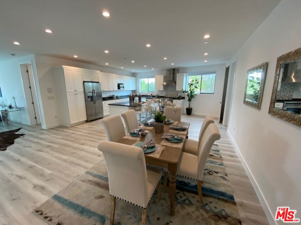 Luxury, stylish & cozy California living - just completed in 2021. Comprised of only 3 units, each more than 2,200 sqf, one unit per level with no adjoining walls, with elevator opening to the unit. 3 large bedrooms, expansive master bedroom with walking closet, large bathroom w/ double sink and grand shower. 2 Other large bedrooms, generous size bathrooms, closets and storage spaces. Double pane windows all around the unit that brings a lot of Light throughout the apartment. High ceilings, LED recessed lighting throughout, Central A/C, large gourmet kitchen with high-end appliances, grand island, quartz countertop, custom-built cabinetry, washer/dryer in each unit, controlled-access garage, 2 parking spots per unit and much more! Short distance to Culver City steps, Beverly Hills, shopping malls, easy access to freeways & Metro station. A MUST SEE!!
