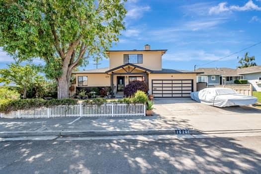 Spacious Family Living in a Desirable Castro Valley Neighborhood Discover the perfect blend of space and comfort in this beautiful 2074 sqft 5 bed, 2 bath two-story home. The flexible floor plan includes a light-filled living room with vaulted ceilings and a separate, cozy family room with a fireplace, creating ideal spaces for both entertaining and quiet relaxation. eat-in kitchen features sleek tiled countertops and stainless steel appliances. Newly installed floors throughout. 3 bed, 1 bath down, Upstairs, the expansive primary suite offers a private retreat with a beautifully updated bath plus balcony with bay views. Step outside to a private, landscaped backyard with a Trellis , perfect for enjoying tranquil evenings. Located moments from award-winning schools, local parks, and Castro Valley's convenient amenities, this home provides an exceptional quality of life.