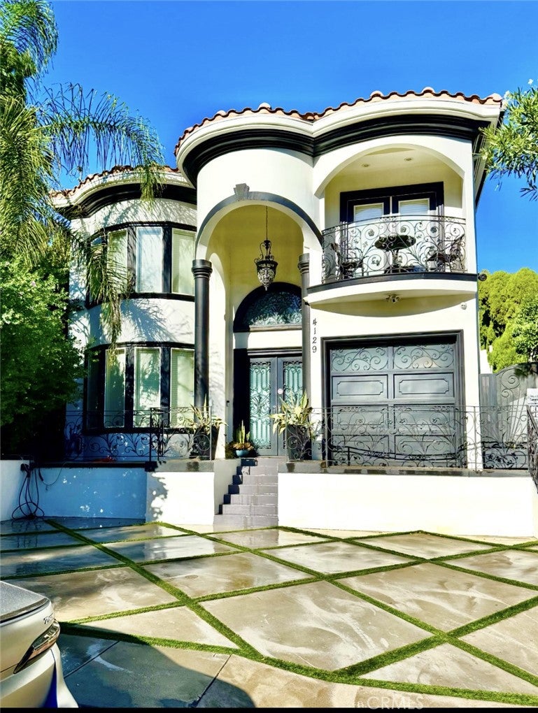 Photo of 4129 Stone Canyon AVE, Sherman Oaks, CA 91403 (MLS # GD26224437)