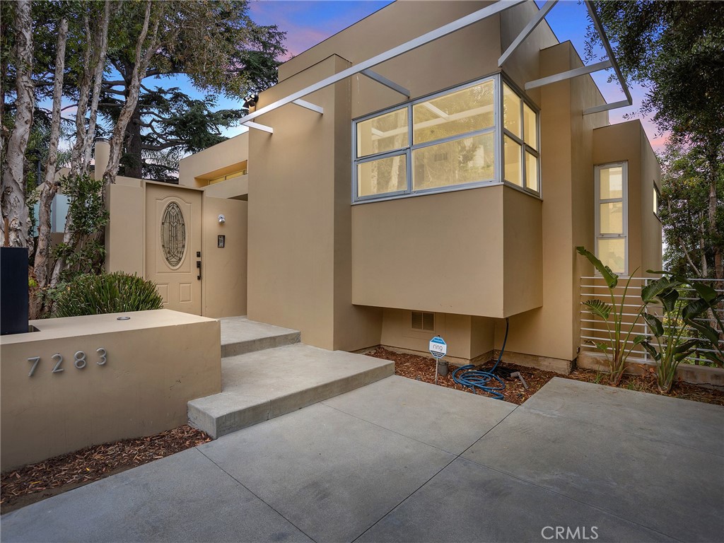 This one-of-a-kind, custom-built home offers a rare opportunity to live in a stunning 2-story residence with incredible city lights views. Nestled on a 6,216 square foot lot, the home boasts 2,234 square feet of living space, including 4 spacious bedrooms and 3 beautifully designed bathrooms. At just 21 years old, this home combines modern finishes with thoughtful design. Upon entering, you are greeted by a formal entryway that leads into a grand living room featuring a cozy fireplace, perfect for those cool evenings. The remodeled kitchen is a chef's dream, complete with sleek stainless steel appliances and ample counter space for meal preparation. A formal dining room adds elegance to the home, offering the ideal setting for entertaining guests. The primary suite is truly a retreat, with luxurious details and ample space to unwind. Step outside to enjoy the expansive patios, where you can relax and soak in the stunning views. The backyard is home to an amazing pool, ideal for warm weather relaxation or poolside gatherings. For movie enthusiasts, an impressive screening room awaits, offering a cinematic experience right at home. Central heat and air ensure year-round comfort, while a 2-car attached garage with direct access adds convenience and practicality. Located in a serene cul-de-sac, this home offers the perfect blend of luxury, comfort, and convenience. With too many features to list, it's a must-see to truly appreciate all that it offers.